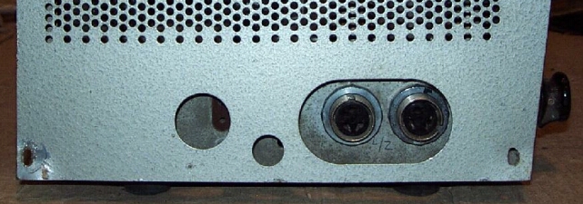 Microphone connectors on left side, perf-metal cover